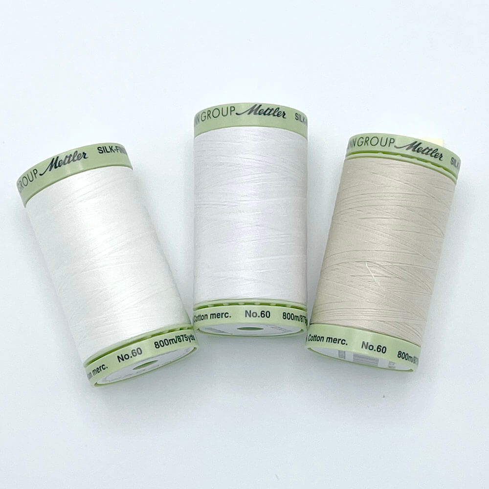 Mettler Silk Finish 60wt 875 yds Candlewick, Pine Nut, White